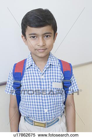 Portrait of a schoolboy smiling View Large Photo Image Stock Photography - Portrait of a schoolboy smiling. Fotosearch