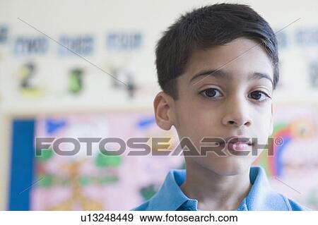 Stock Photo - Portrait of a schoolboy. Fotosearch