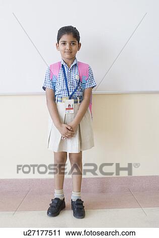 Portrait of a schoolgirl smiling View Large Photo Image Stock Image - Portrait of a schoolgirl smiling. Fotosearch