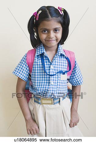 Stock Photography - Portrait of a schoolgirl smiling. Fotosearch