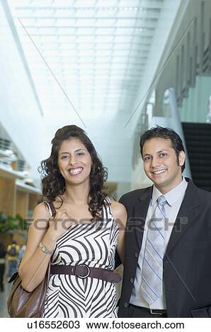 Portrait of a couple smiling View Large Photo Image Stock Image - Portrait of a couple smiling. Fotosearch