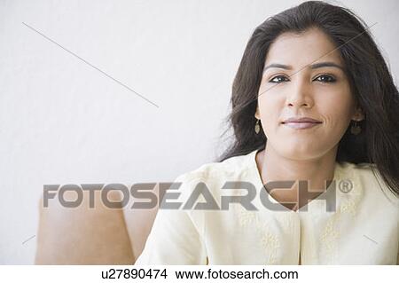 Picture - Portrait of a young woman smiling. Fotosearch