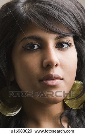 Portrait of a young woman View Large Photo Image Stock Photo - Portrait of a young woman. Fotosearch