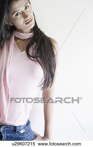 Portrait of a young woman posing View Large Photo Image Stock Photography - Portrait of a young woman posing. Fotosearch