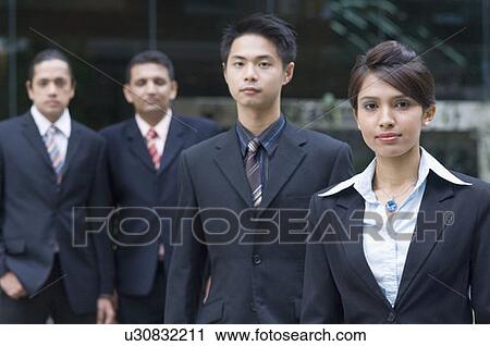 Portrait of a businesswoman with three businessmen, Singapore View Large Photo Image Stock Image - Portrait of a businesswoman with three businessmen, Singapore. Fotosearch