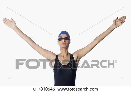 Young woman with her arms outstretched View Large Photo Image Stock Photography - Young woman with her arms outstretched. Fotosearch