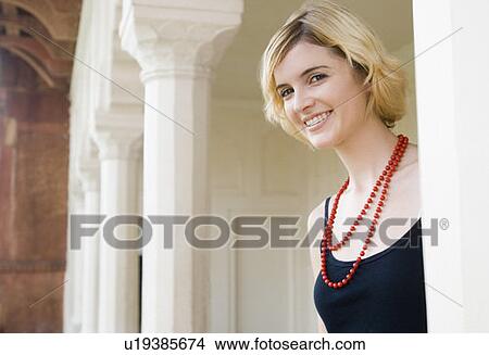 Portrait of a young woman smiling, Taj Mahal, Agra, Uttar Pradesh, India View Large Photo Image Picture - Portrait of a young woman smiling, Taj Mahal, Agra, Uttar Pradesh, India. Fotosearch
